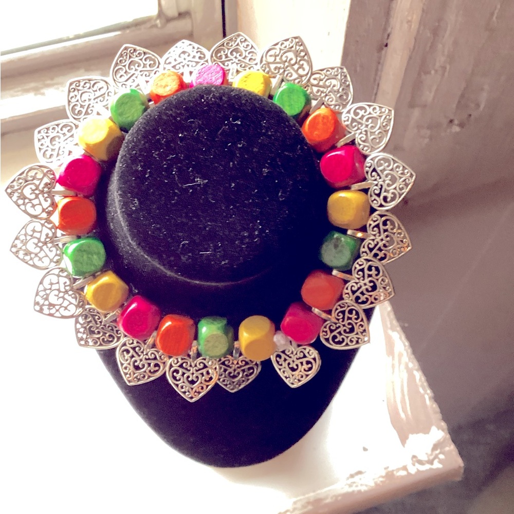 Handmade with Sterling, silver heart charms multicolored bracelet.